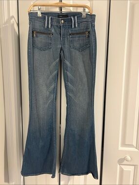Classic Blue Flare Jeans with Zip-Front Pockets